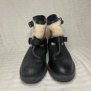COACH black leather boots with fuzzy ankle detail